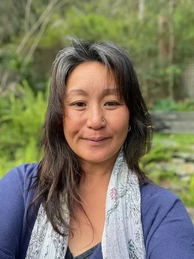 Cheryl Huish, counsellor and external social work supervisor, smiling outdoors